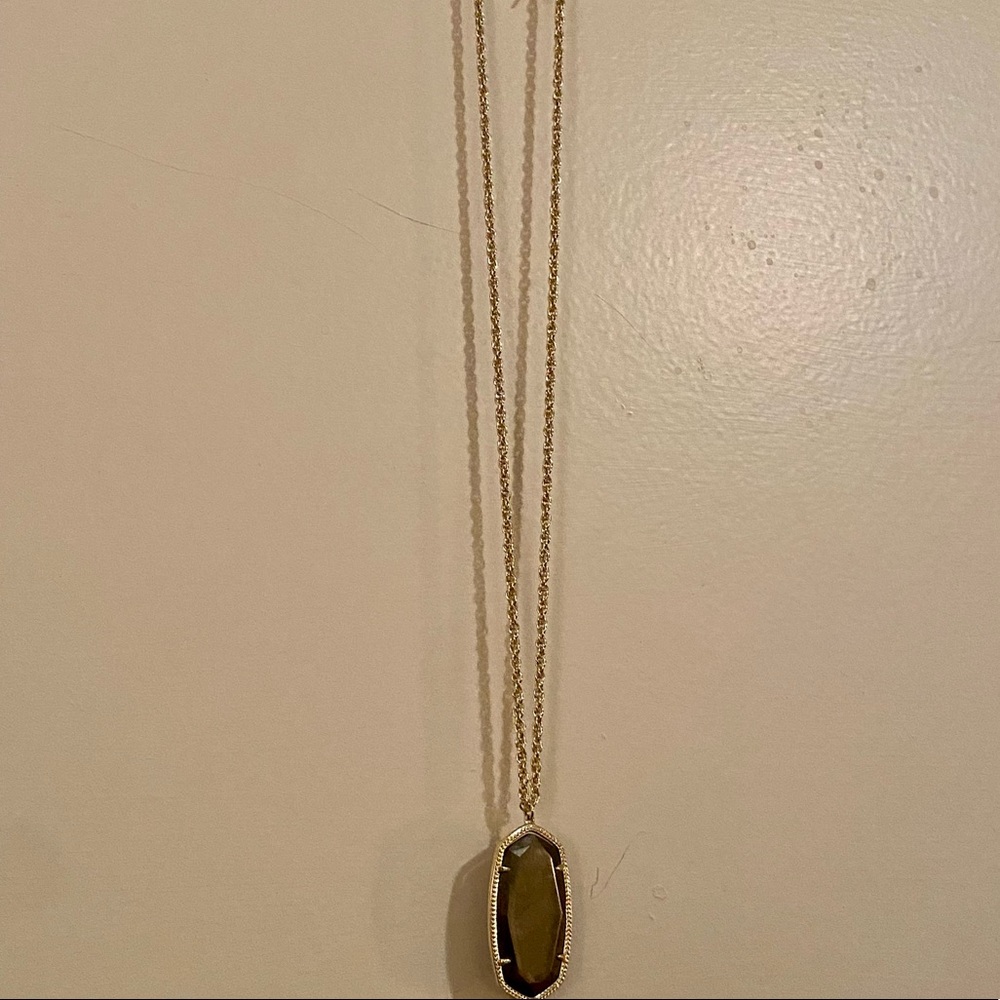 Dark charcoal gray & gold Kendra Scott medallion long chain necklace.